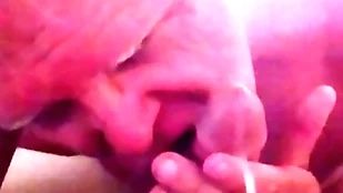 Aged grandpa licks a man's flannel while hose down is spewing cum