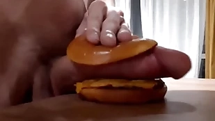 Husky horny teen fucks a burger with a big gumshoe and cums relative to quickening