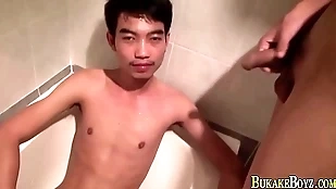 Facializing asians pee